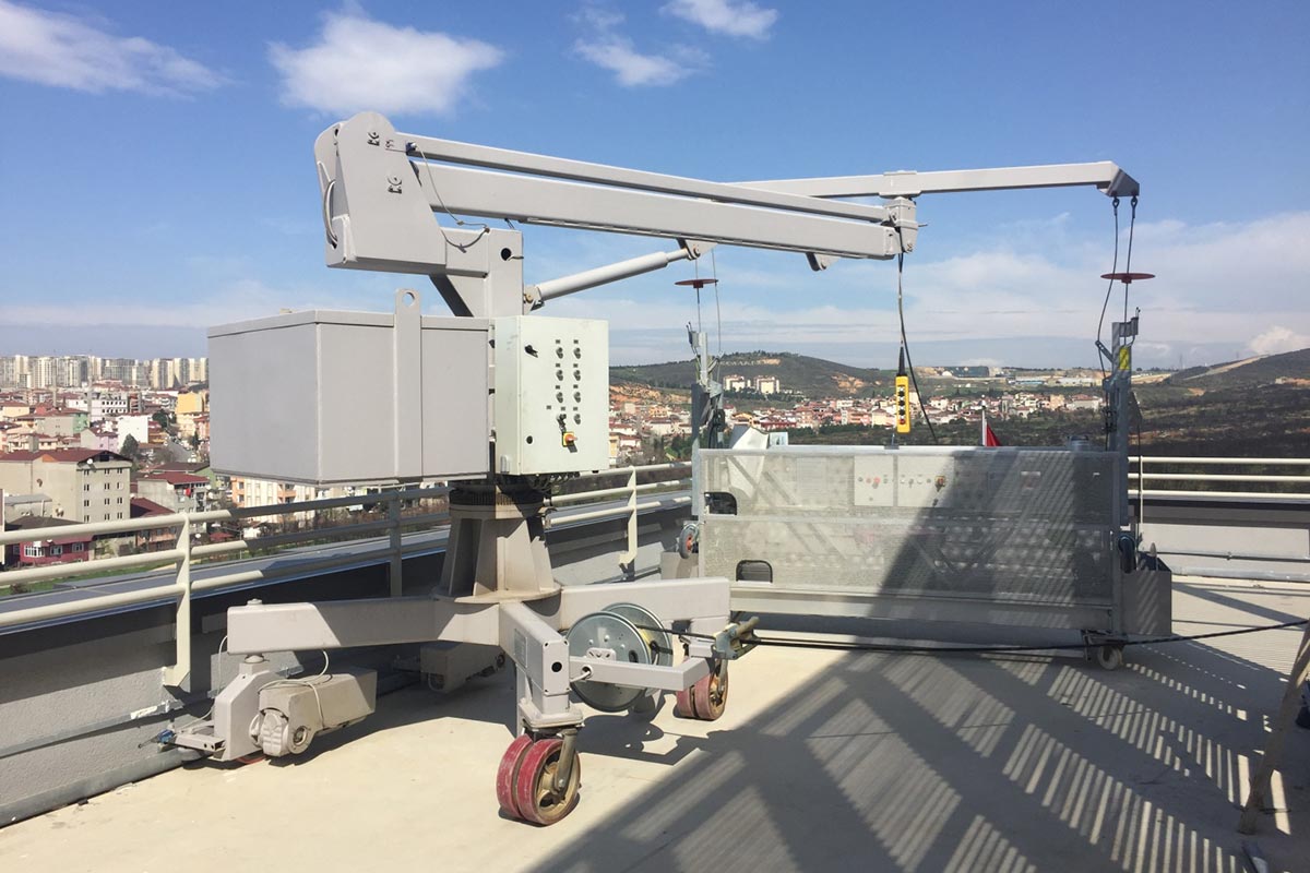MW types have single jib and luffing mast, designed for short and medium outreaches. Luffing system is used to adjust outreach and able to pass platform over the paraphet. Systems are located on building terraces, buildings up to 320 m height. 