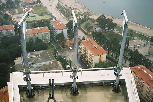 Davits are installed in the sockets on terrace floors or inner surfaces of the parapets. 
