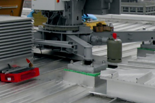 In case there is no available space behind the paraphet on the terrace for rail track options, then BMU can be installed on fixed plinths usually in the middle of the roof. 