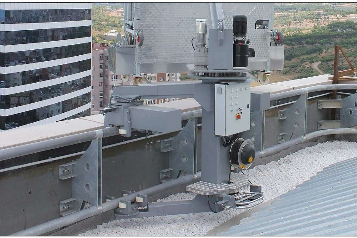 This paraphet mounted machine system can be used , where applicable,when there is not enough space to make a track rail or L-Guide on the roof of the building. in this case, the paraphet should be
strong enough.